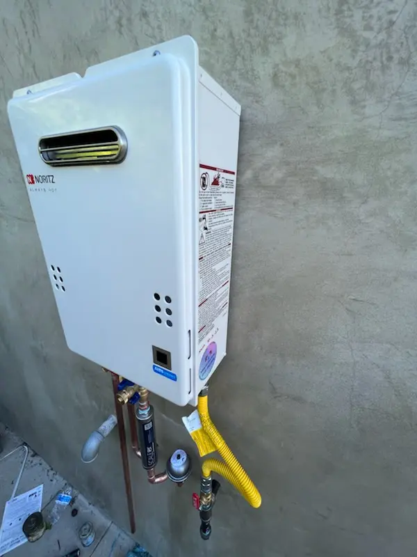 Tankless water heater installation for Meadow Village homes